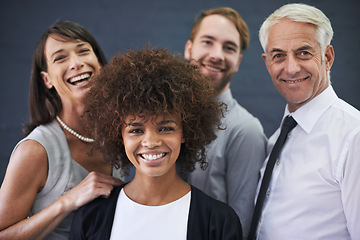 Image showing Portrait, team and happy business people in studio isolated on a blue background. Face, smile and group of diverse professional consultants laughing for collaboration, cooperation or working together