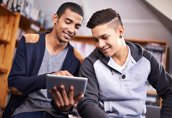 Image showing Tablet, students and brainstorming for project in library and diversity for knowledge in university. Young men, technology or collaboration for assignment or online research for education in college