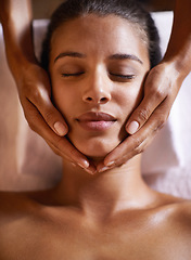 Image showing Woman, spa and massage on face with hands and care for facial, wellness and beauty treatment on bed. Above, towel and calm african female woman with skincare and relax at a hotel with skin glow