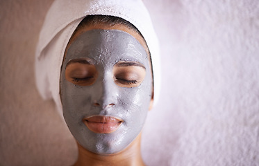 Image showing Woman, mask and facial in spa for skincare, beauty and cosmetic treatment for break or peace. Young person and natural for holistic therapy for wellness, clean and hygiene with product for peel