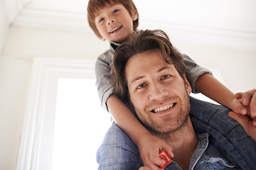 Image showing Father with son on his shoulders, portrait and home with smile and love with single parent and bonding together. Family, dad carrying boy and childhood with fun and playing with joy and happiness