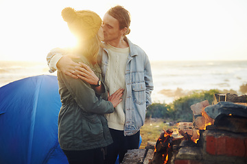 Image showing Happy couple, love and bonding together by campfire, blanket and romantic getaway with camping in forest. Man, woman and relax on vacation on weekend break, countryside and travel in woods for sunset