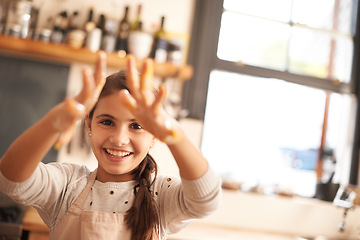 Image showing Girl, portrait and hands for baking in kitchen, pastry and happy for food preparation in home. Female person, kid and smile for learning in home, child development and education for skills or cake