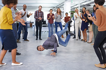 Image showing Breakdance, office and business people in celebration for success, teamwork and achievement at startup. Dance, team building and excited staff with applause, smile and happiness in circle with fun