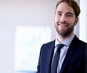 Image showing Business, smile and portrait with man, startup and professional with confident employee and ambitious worker. Face, person and entrepreneur in a suit, formal and happy consultant in a modern office