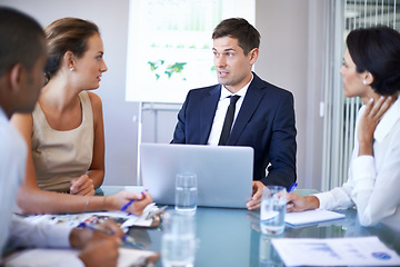 Image showing Coworker, office and meeting with laptop for discussion on contract, paperwork and teamwork or collaboration. Business people, boardroom and boss in table with strategy, feedback and company growth.