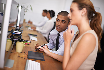 Image showing Business people, meeting and thinking with designer on computer for digital design or development at office. Young man, woman or creative employees working on desktop PC for project, tasks or startup