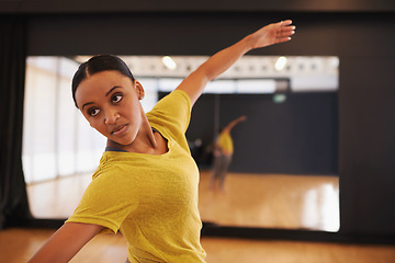 Image showing Ballet, dance and woman in fitness studio for performance, show or theater rehearsal. Art, balance or female dancer with classic, beauty or movement for ballroom, steps or warm up for stage training