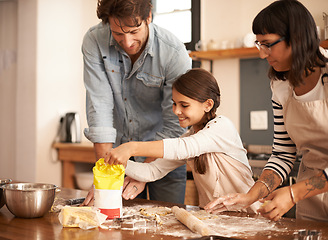 Image showing Mother, father and girl with flour for cooking in kitchen with dough, happiness and teaching with support. Family, parents and child with helping, learning and bonding with baking for cake or cookies