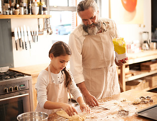 Image showing Girl, child or grandpa with flour in kitchen for cooking, baking and teaching with support or helping. Family, senior man or grandchild with dough preparation in home for bonding, learning or cookies