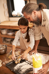 Image showing Girl, child and grandfather with cooking in kitchen for cookies, baking and teaching with support or helping. Family, senior man or grandchild with biscuit preparation in home for bonding or learning