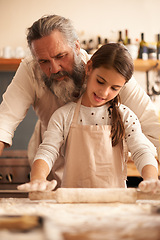 Image showing Girl, child and grandfather for cooking with dough for baking and teaching with support, helping or rolling pin. Family, senior man or grandchild with cake preparation in home for bonding or learning