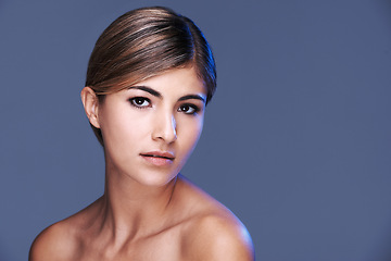 Image showing Portrait, skincare and mockup with natural woman in studio isolated on grey background for wellness. Aesthetic, beauty and transformation with confident young model on space for dermatology treatment