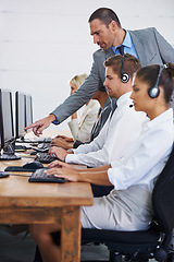 Image showing Help desk, management and row of women, men and typing on computer at customer support. Headset, telemarketing and client service agent at callcenter for online consultation, team or checking quality