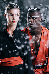 Image showing Fashion, snow and man with woman, Asian and stylish clothes with winter weather and traditional outfit. People, karate and uniform with elegant and beauty with makeup and glamour with confidence