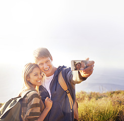 Image showing Phone screen, selfie and hiking couple hug in nature for photography, memory or blog profile picture. Smartphone, app and people outdoor with love, happy or smile for social media travel vlog update