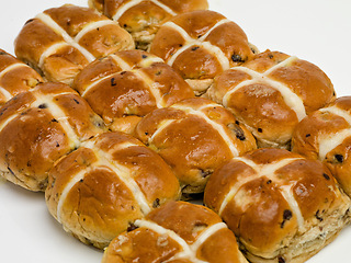 Image showing Hot cross, buns and easter for holiday food or vacation brunch as celebration baked goods, traditional or religion. Snack, meal and festive season fiber or nutrition dessert as treat, recipe or event