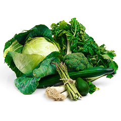 Image showing Organic, ingredients and green vegetables in studio for vegetarian food, healthy diet and nutrition. Fresh produce, groceries and harvest on white background for dinner, vegan lifestyle and wellness