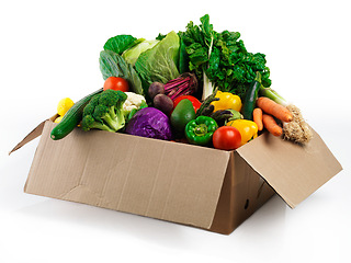 Image showing Studio, box and fresh or organic vegetables for nutrition or wellbeing, ripe and raw ingredients for sustainability or eating. Agriculture, produce and healthy diet for vegan, wellness and protein.