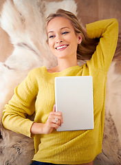 Image showing Tablet, thinking and social media with woman on floor of home for browsing, communication or weekend free time. Technology, vision and relax with young person in living room of apartment from above