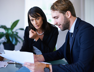 Image showing Business people, teamwork and boardroom meeting or paperwork or financial growth, partnership or coworkers. Man, woman and document in conference room or review, project planning or problem solving