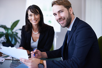 Image showing Business meeting, contract and smile of HR with employee, professional and office of corporate company. Portrait, woman and man sign paperwork of sales agreement on desk or table for job and career