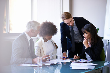 Image showing Corporate, employees and meeting in conference room for strategy or collaboration for planning, partnership and conversation. Boardroom, business people and reports for b2b discussion for company.