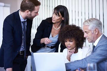 Image showing Business, meeting and brainstorming with diversity, laptop and technology in office. Businessman, woman and team with teamwork, planning and support for corporate discussion with staff or partnership