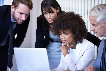 Image showing Business, meeting and discussion with diversity, laptop and technology in office. Businessman, woman and team with teamwork, planning and support for corporate brainstorming with staff or partnership