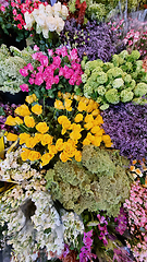 Image showing A bunch of flowers on a table