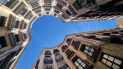 Image showing BARCELONA, SPAIN - APRILL 2, 2024: Looking up at the architecture of a building