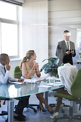Image showing Meeting, presentation and businessman in office with window, report or speaker at b2b workshop. Teamwork, discussion and business people in conference room brainstorming ideas, planning and review