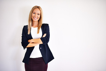 Image showing Business woman and smile with confidence in studio on white background for corporate and company as hr. Portrait, female person and happy or satisfied on career with growth, progress and job