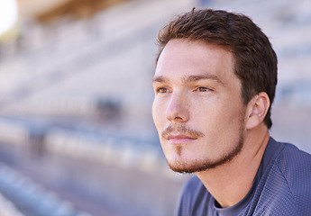 Image showing Man, thinking or idea of fitness, workout or exercise as planning, health or sport stadium. Male runner, vision or motivation to wellness, training or performance as cardio, commitment or outdoor