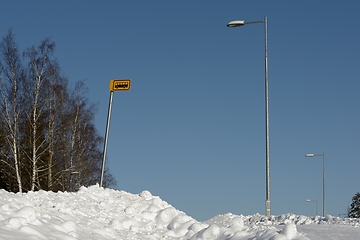 Image showing bus stop outside the city in winter on a cloudy day in Finland