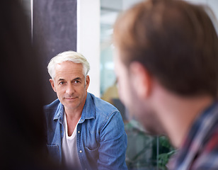 Image showing Leader, ceo or male senior manager in meeting, employees and teamwork for corporate professionals. Business, collaboration and management with mature man mentor, training or talking in office