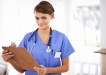 Image showing Happy woman, portrait and nurse with clipboard for prescription or medical checklist at hospital. Female person, practitioner or scrub with smile, documents or paperwork for life insurance at clinic