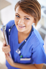 Image showing Woman, nurse and smile portrait with clipboard in medical office, nutritionist and stethoscope, professional nursing career. Results, healthcare and medic for wellness in uniform for surgery