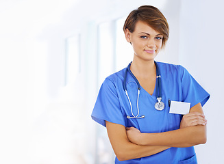 Image showing Pride, arms crossed and portrait of nurse in healthcare for clinic, support and life insurance. Scrubs, stethoscope and woman with smile for confidence, medical service and wellness at hospital