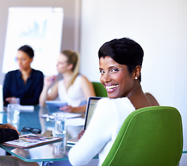 Image showing Black woman, meeting and happy at office to brainstorm for feedback and company growth. Entrepreneur, portrait and female person with people at work in boardroom for paperwork, update and smile