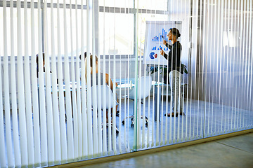 Image showing Business people, meeting and boardroom presentation with graphs teamwork for financial analytics, charts or glass wall. Women, coworker and conference room for company coaching, review or strategy