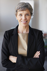 Image showing Mature, businesswoman and portrait as corporate professional for financial advisor or advice, investment or accounting. Female person, face and arms crossed in office for pride, trust or confidence