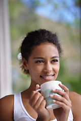 Image showing Coffee, thinking and woman at home with peace, reflection or enjoying a calm moment. Face, remember and female person on a house terrace with tea, idea or happy, memory or insight with view of nature