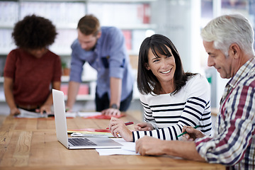 Image showing Business people, discussion and laptop in workplace with technology, teamwork and document for working. Collaboration, professionals and brainstorming for project or career in meeting with smile