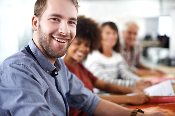 Image showing Boardroom, portrait and man with smile for teamwork with colleagues, project and documents for working. Creative, male person and guy with happiness for career in company, employee and staff