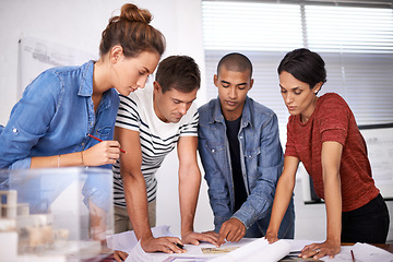 Image showing Team, planning and architects with blueprint for discussion, construction or serious people in creative startup. Diversity, design or engineer group with drawing for brainstorming in meeting together