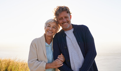 Image showing Smile, hill and portrait of senior couple in nature for sunset walk, travel or retirement vacation. Coast, field and people with happiness for bonding, summer holiday or tourism in California