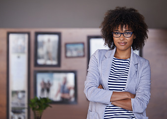 Image showing Home office, portrait and confident businesswoman with glasses, pride and professional at window. Female person, business and woman with arms crossed for break or startup and entrepreneur indoors