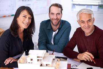 Image showing Portrait, architects and teamwork with building model, design and development with colleagues. Smile, remodeling and construction in office for meeting, contractor or property developer for project