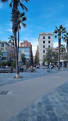 Image showing BARCELONA, SPAIN - APRILL 2, 2024: City street with palm trees and buildings